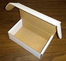 Corrugated shipping boxes for secure mailing cell phone